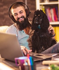 Man-working-from-home-with-dog