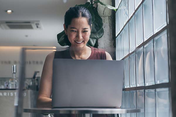Asian woman on a laptop