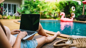 Woman-working-by-a-pool